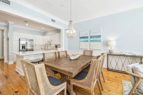 Gather around your elegant dining table while the chef in your group creates culinary magic in the gourmet kitchen just steps away.