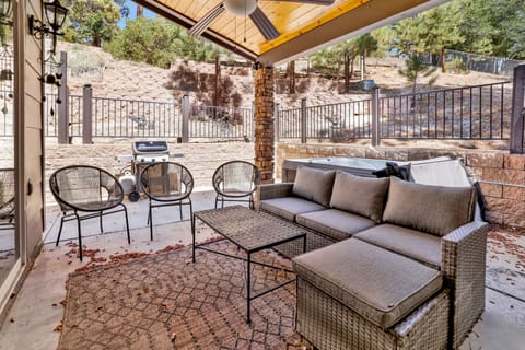 Private outdoor hot tub, surrounded by tall pines, perfect for relaxing under the trees after a day of adventure—enjoy peaceful forest views, fresh air, and a truly rejuvenating stay.