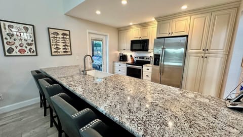 Seating for 4 at the bar. Deck access for grilling.