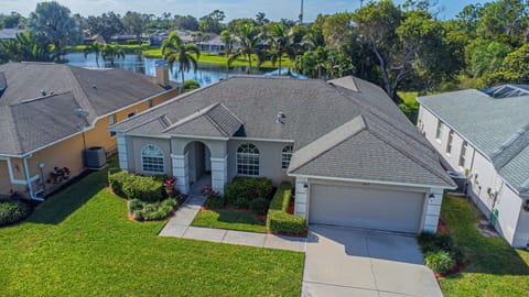 967 Briarwood Blvd - beautiful lakefront 4 bedroom vacation rental with west facing pool in Briarwood, Naples, FL