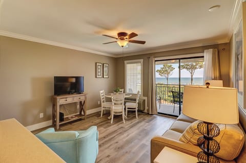 Living room/dining room - Beautifully renovated villa with living and dining combination.  Check out the view!