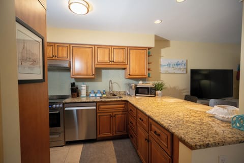 Kitchen area with stainless steel appliances