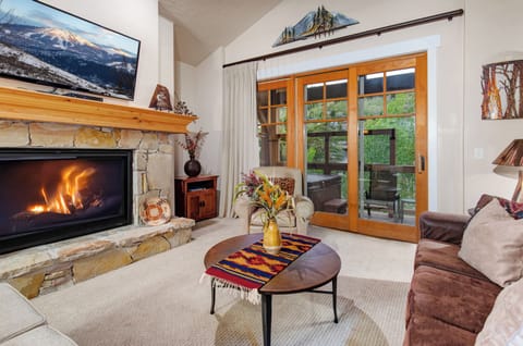 Cozy up by the crackling fireplace or step out to your private balcony to soak in mountain views—your perfect retreat after a day of adventure.