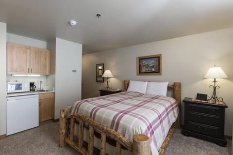 Has a wet bar with microwave, mini refrigerator, and coffeemaker.