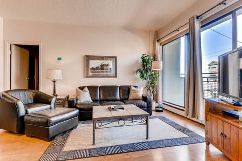 The comfortable living room with a couch and love seat.