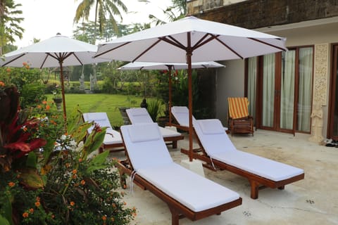Sundeck with six loungers and lazy chair for guests leisure