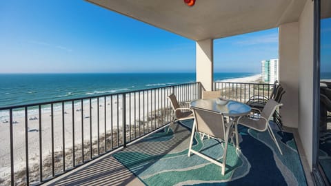 Enjoy meals or drinks at the outdoor table while taking in the beautiful coastal views from your balcony