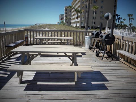Charcoal grills/smokers/picnic area next to pool & beach
