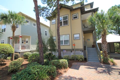 Starfish & Coffee, front of home with covered carport and garage to the right