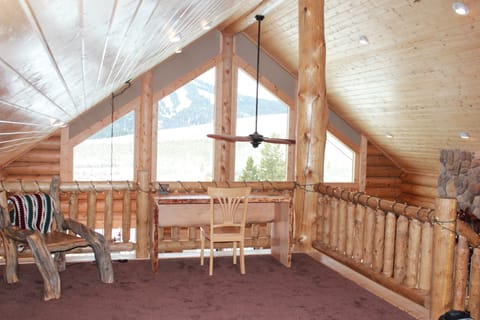 view of loft & desk.