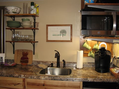 Convection/Microwave provides small oven in kitchenette.