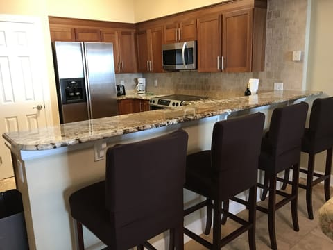 Countertop bar seating with 4 bar stools 