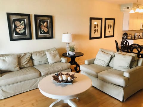 Living room with sofa, loveseat, and chair (not shown)