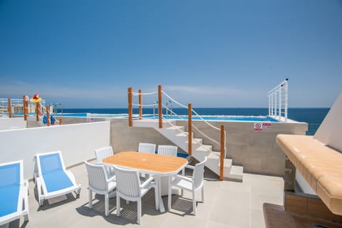 Outdoor Area; Table, Chairs and Sun Loungers