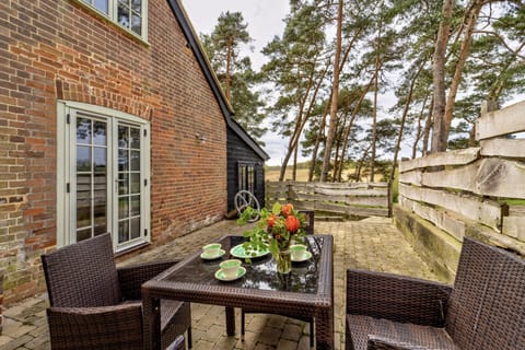 The Buttery, Freston: Enclosed courtyard with outdoor furniture