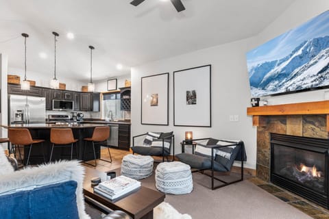 Vacation Rentals in Park City at Bear Hollow Lodges 3401: Living room with gas fireplace and private balcony access