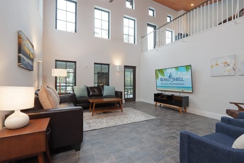 Living area with large wall mounted TV