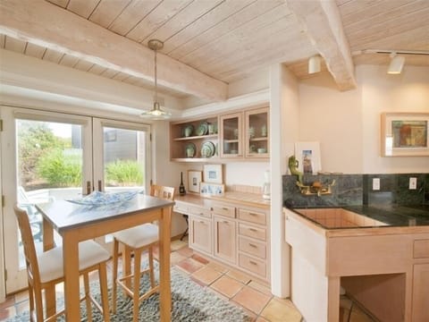 Extended garden section of kitchen with private decks.