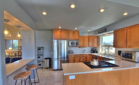 Spacious and well lit, this modern kitchen will elevate your culinary adventures.