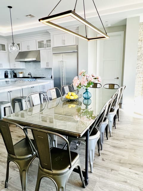 Interior dining plus nearby bar stools.