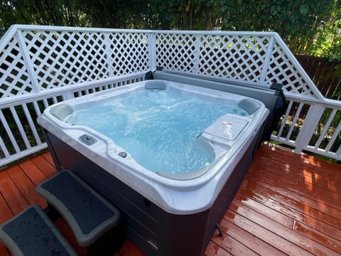 Enjoy our BRAND NEW 7 person Sundance hot tub after a day at the beach!