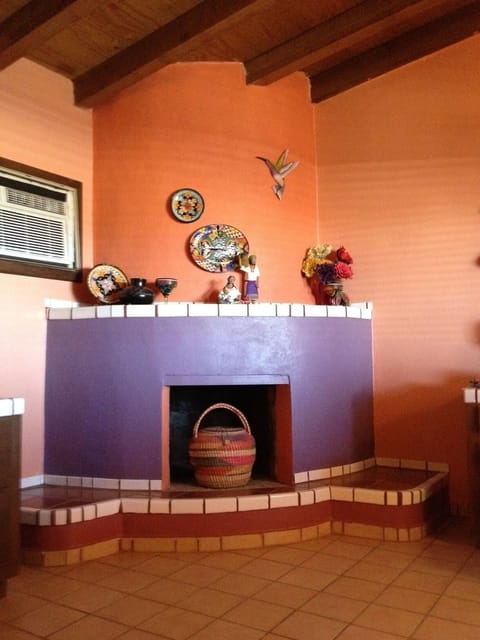 Fireplace in casita living room. Decorative only.