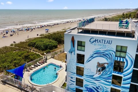 Experience beachfront living with direct access to sand and surf