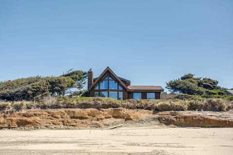 A lovely private home on a bluff above a beautiful sandy beach.