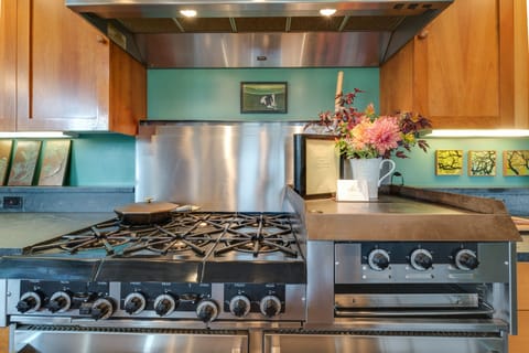 The Garland range with six burners on the left, salamander and grill on right.