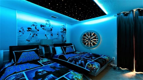 Kids will have fun in this Star War bedroom with beautiful lights.