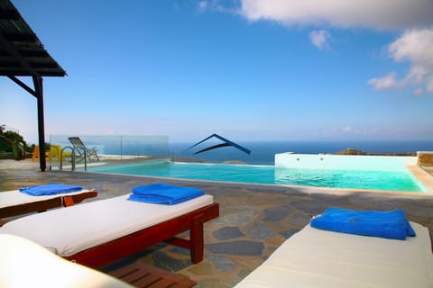 The large terrace with the swimming pool and fantastic sea view