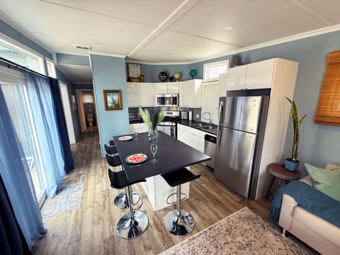 Includes blender, bean grinder,waffle maker,  and toaster/airfryer. Seats 4