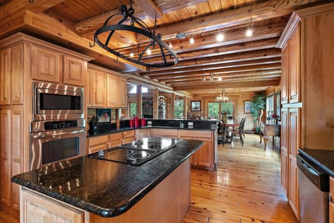 Spacious Kitchen with Granite Counters and Stainless Appliances