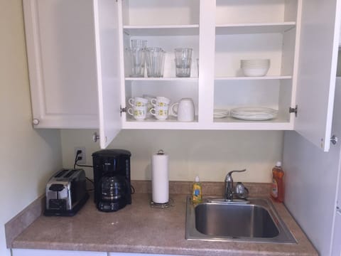 Dishes and glasses if you decide to dine in.  Enjoy coffee or tea before leaving