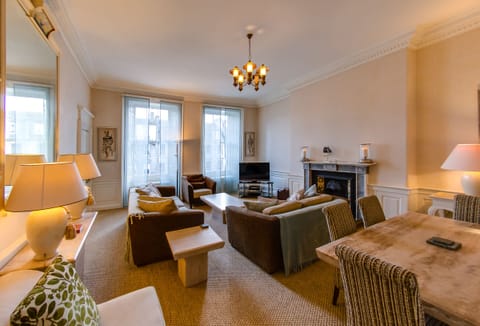 large comfortable Living Room with luxury, decor throughout.