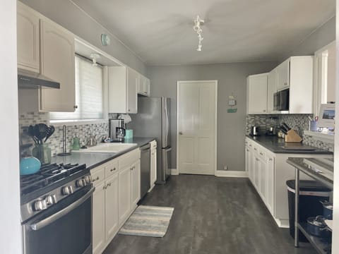 View of one end of the kitchen looking to laundry room doorway