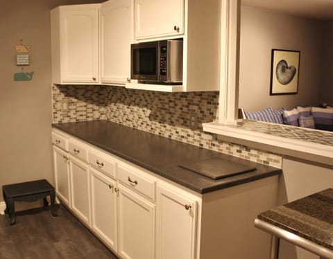 Other side of kitchen with additional  7 feet of counter space plus 4 ft island!