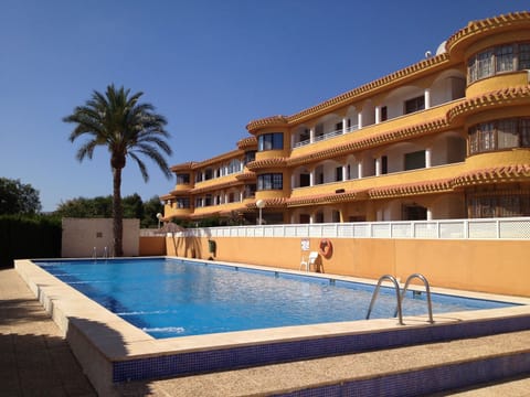 Pool and apartment (ground floor right) view