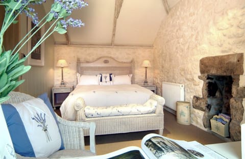 First floor: Double with 6' super -king bed and en-suite shower room