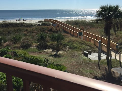 Balcony view! New boardwalk to the beach from our building.