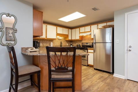 Enjoy preparing meals in the functional kitchen with stainless appliances and a convenient breakfast nook