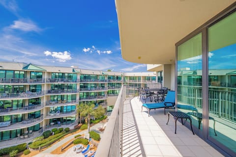 Take in the beautiful surroundings and soothing sounds from your balcony overlooking the bay and pool area