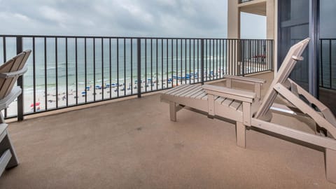 Relax in the outdoor seating area, taking in the views of the beach and waves while enjoying the fresh air