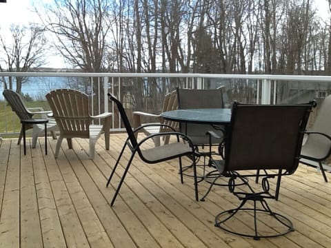 Enjoy family time on the deck with partial view of the river beyond.
