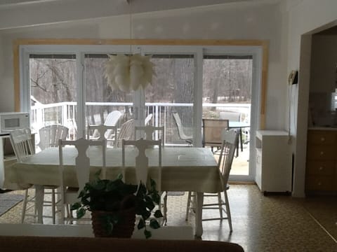 Enjoy dinners in large living room/dining room open to kitchen & deck.