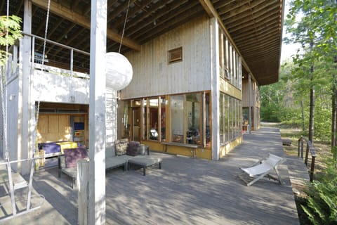 Cameron Point Harbour House with afternoon sun from NW patio which overlooks our private harbour and beach below. 2 families or groups up to 12 can share a vacation yet enjoy privacy in this award-winning complex.
