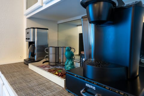 Coffee Bar located in Dining area. There is coffee, tea and condiments for you.