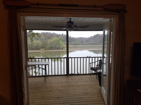 The french doors open to provide expansion to the large mosquito proof porch.