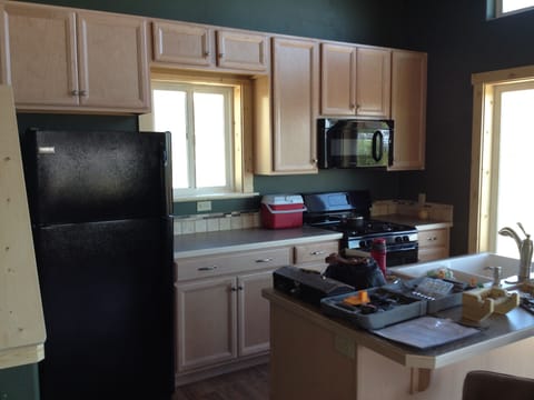 Kitchen with gas stave and microewave