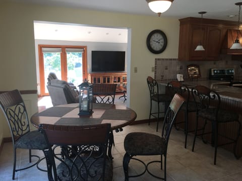 Breakfast Table Leading into Living Area